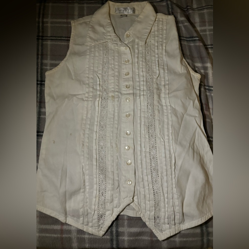 White blouse vest